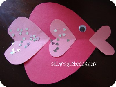 ... Valentine’s Day project. Construction paper hearts are glued