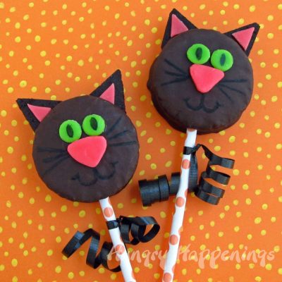 Black Cat Cake pops -October 29th is National Cat day - Sharing our favorite 21 Cat - themed craft activities & books. Free Printable, Art and craft activities and loads of books