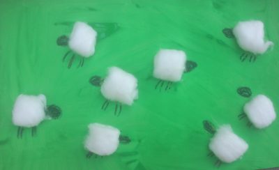 Make an adorable flock of sheep using construction paper, cotton balls 