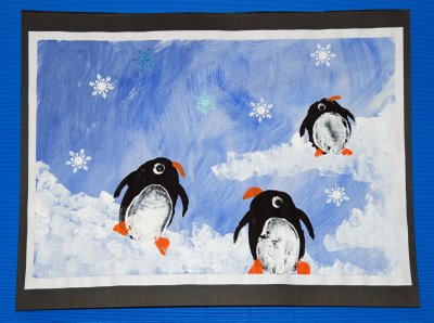 Create a beautiful winter scene featuring potato print penguins. A fun 