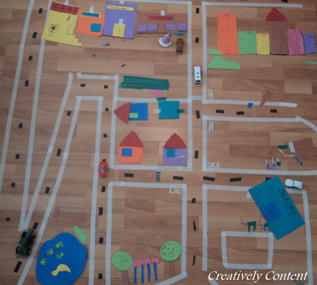 Create a racetrack on the floor with masking tape. Use