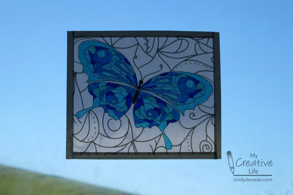 Turn coloring pages into beautiful faux stained glass.