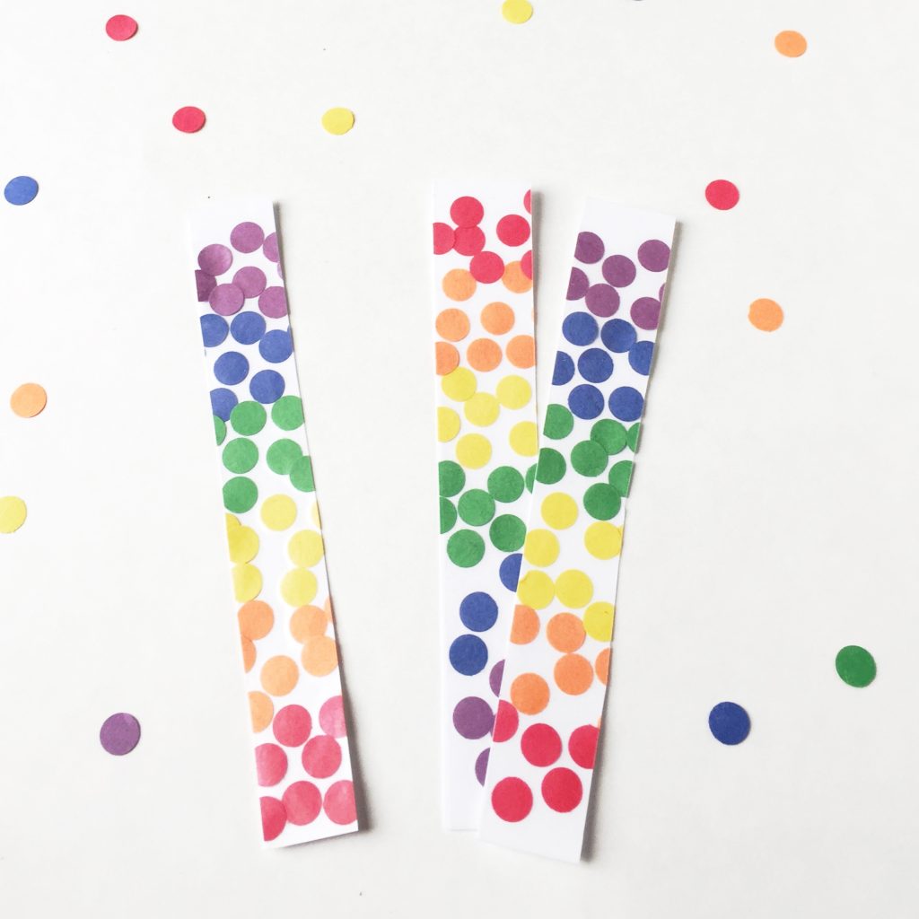 These Rainbow Bookmarks are the perfect toddler craft. Teach color recognition, fine motor skills, and create a beautiful keepsake too!