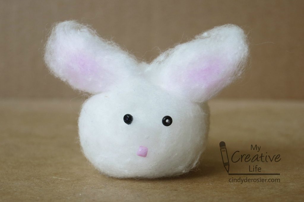 This adorable bunny is made from a cotton ball.