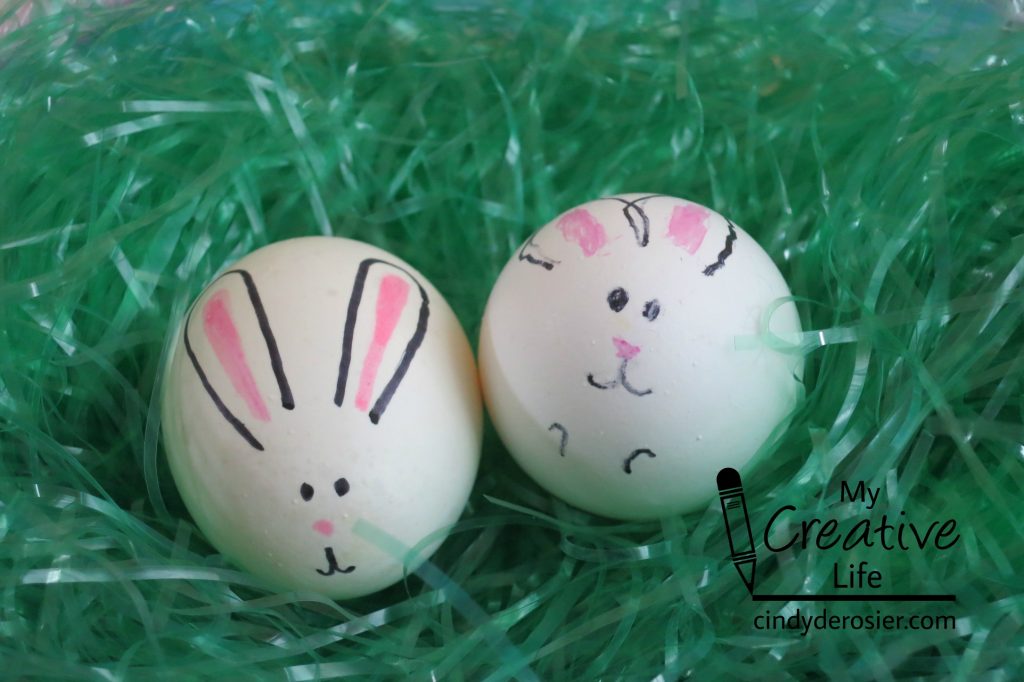 Decorate raw or hardboiled eggs to look like bunnies.