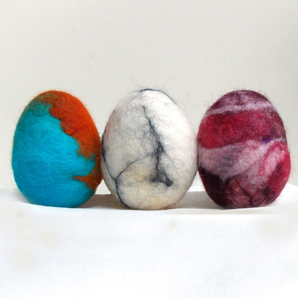 How to Make Wet Felted Easter Eggs with wool, Fun Felted Easter Eggs, a great activity for kids, too! A Felting Tutorial by FiberArtsy.com