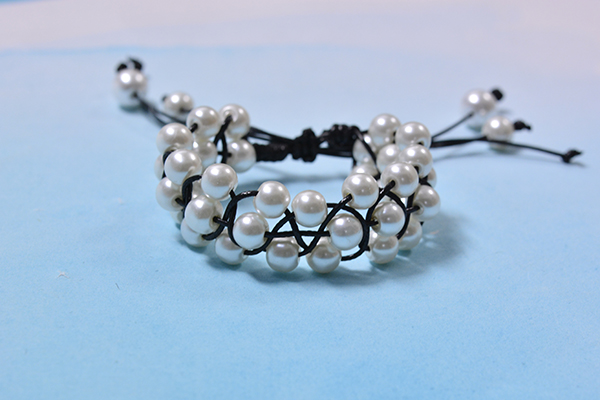 Pandahall Tutorial on How to Make a Black Leather Cord Braided and White Pearl Bracelet