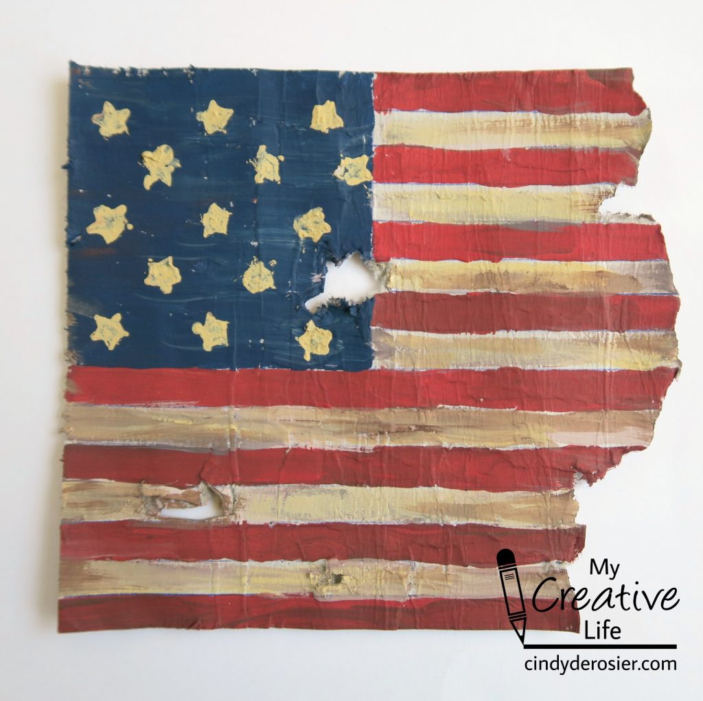 Turn cardboard into a replica of the flag that inspired Francis Scott Key to write The Star Spangled Banner.