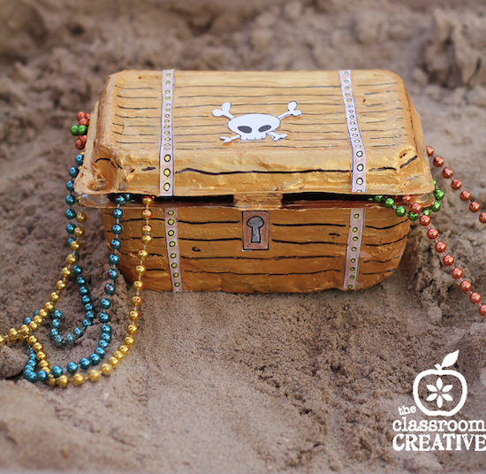 This treasure chest is made from a recycled strawberry container!