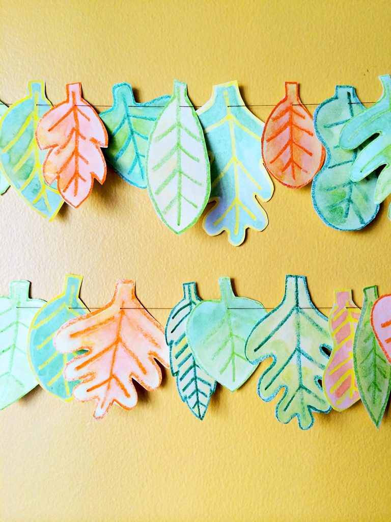 Decorate for fall with a watercolor leaf garland.
